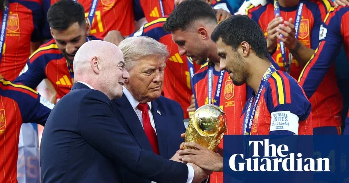 Officials presenting World Cup trophy to Spain team
