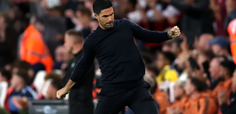 Manager celebrating during a match at the stadium