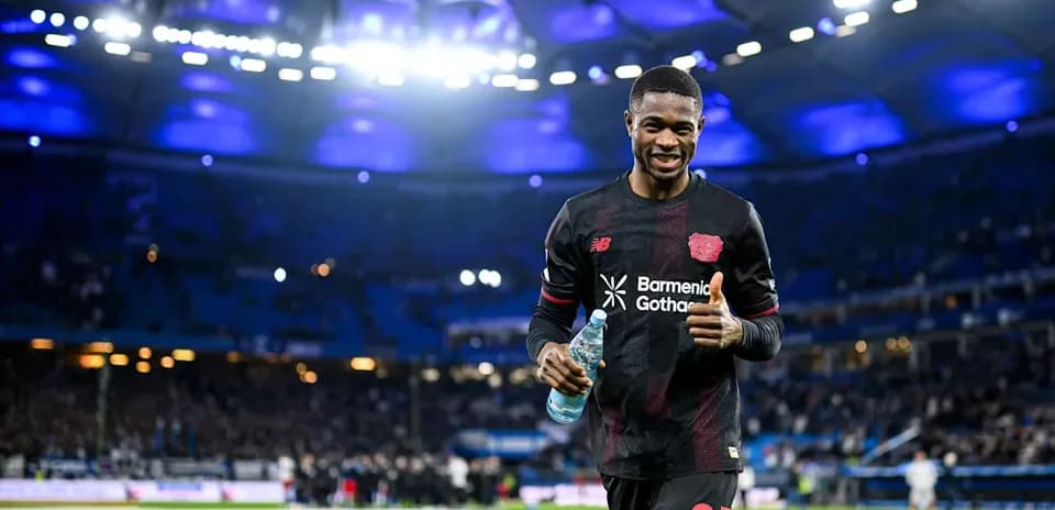 Player celebrating with water bottle on the field