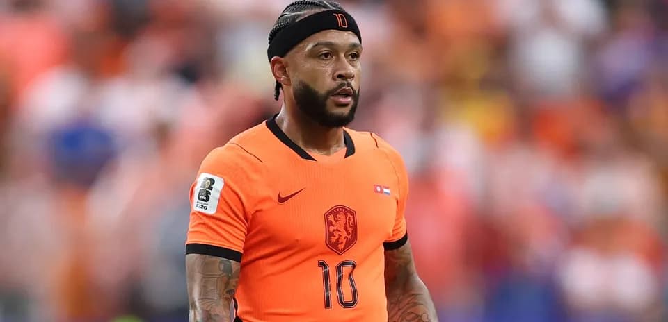 Player wearing orange jersey during match