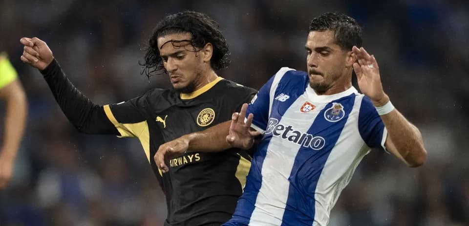 Two players battling for possession during a match