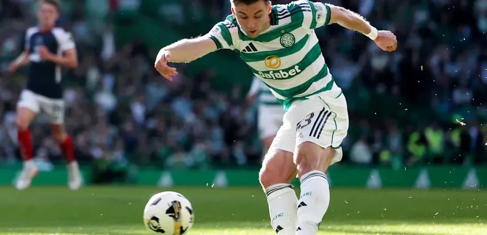 Player kicking ball during a football match