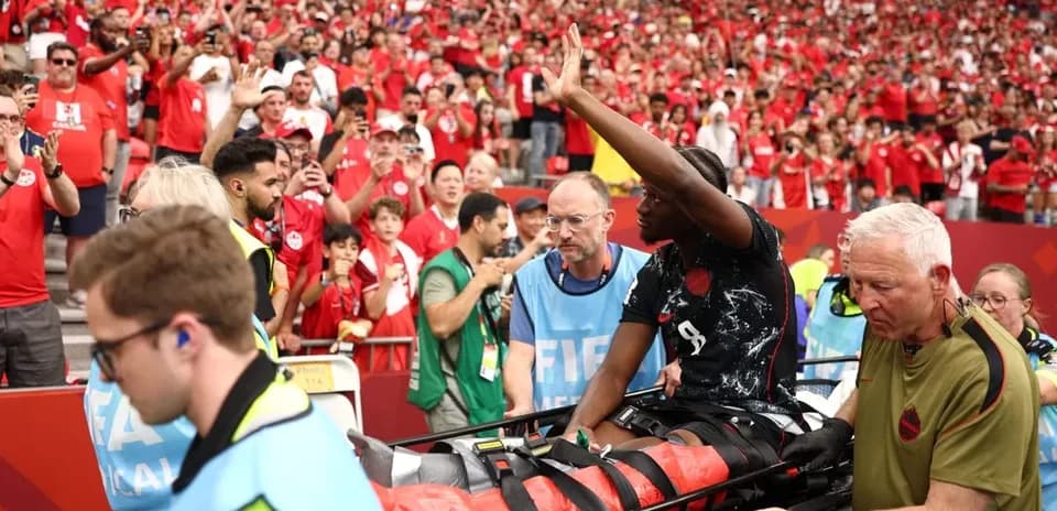 Player being stretchered off field during match