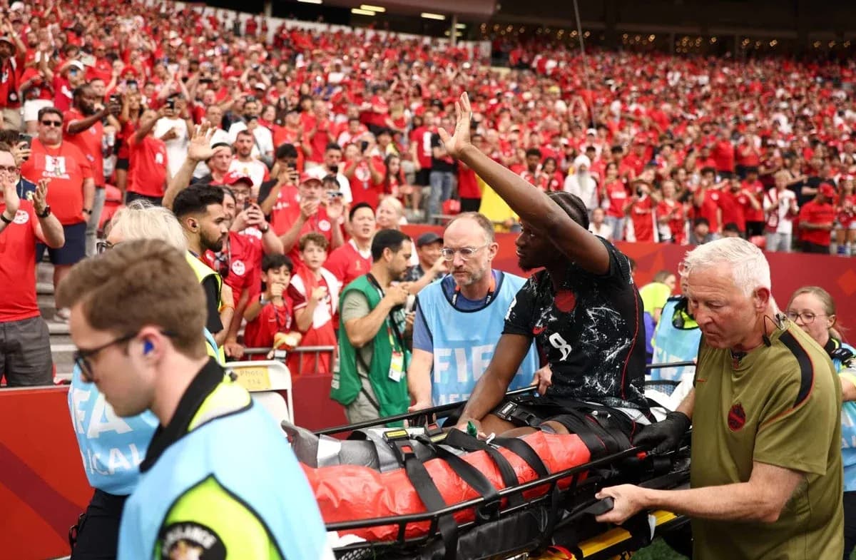 Player being stretchered off field during match