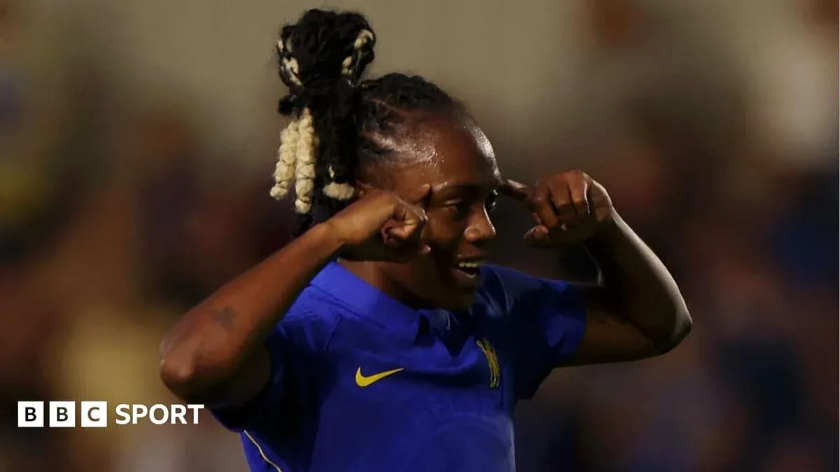 Player celebrating a goal with hand gestures