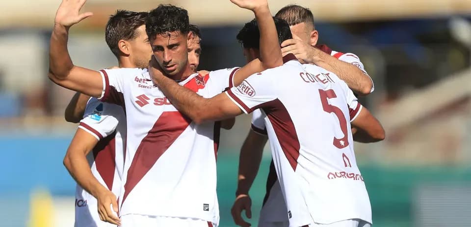 Players celebrating a goal during a match