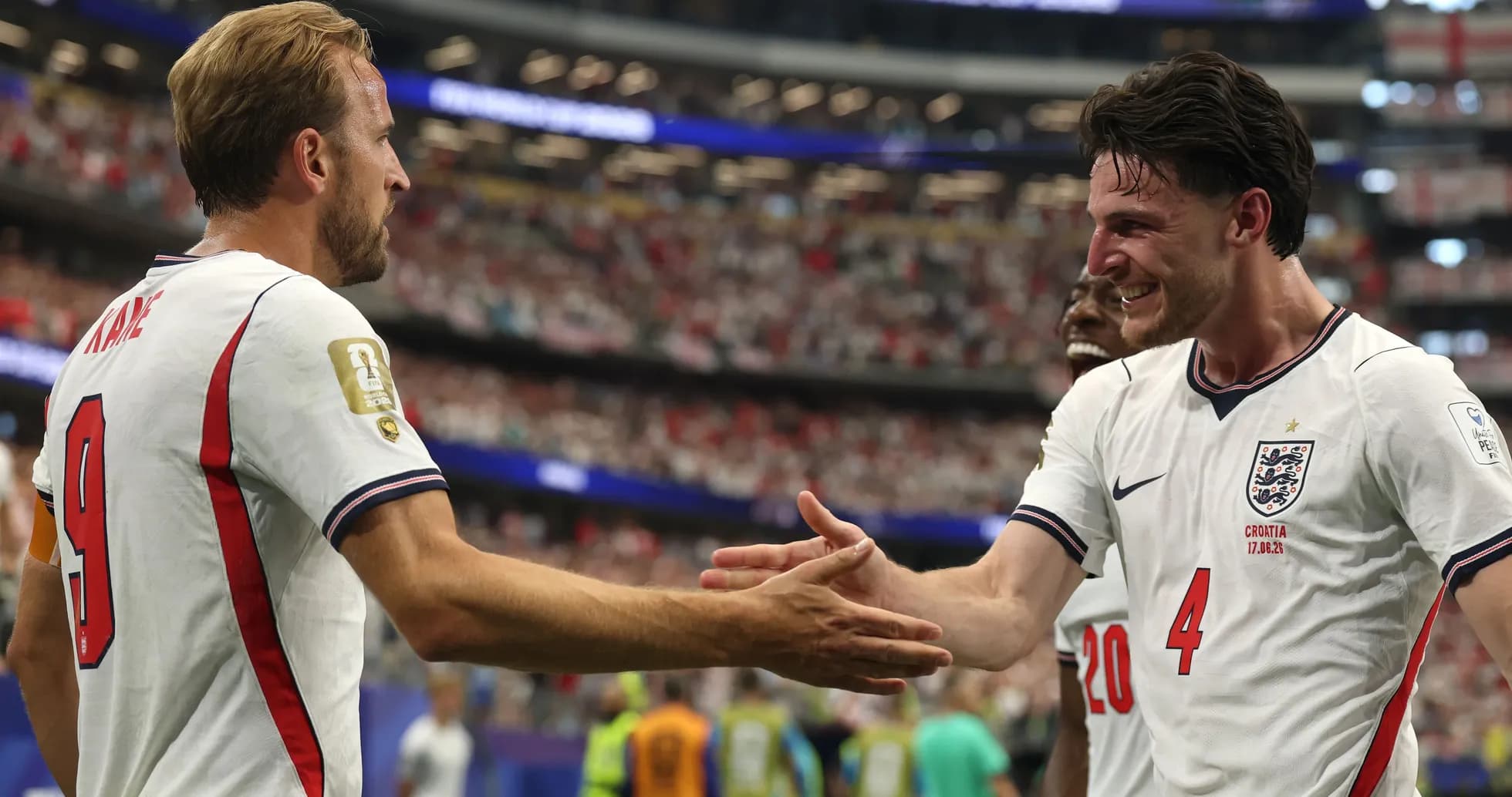 Harry Kane and teammate celebrating a goal