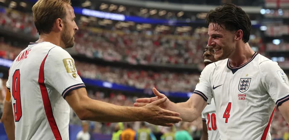 Harry Kane and teammate celebrating a goal