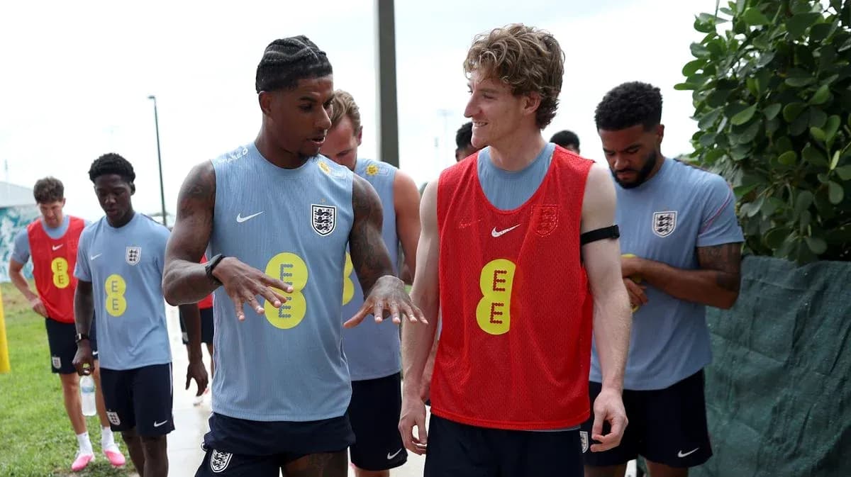 Players conversing during training session outdoors