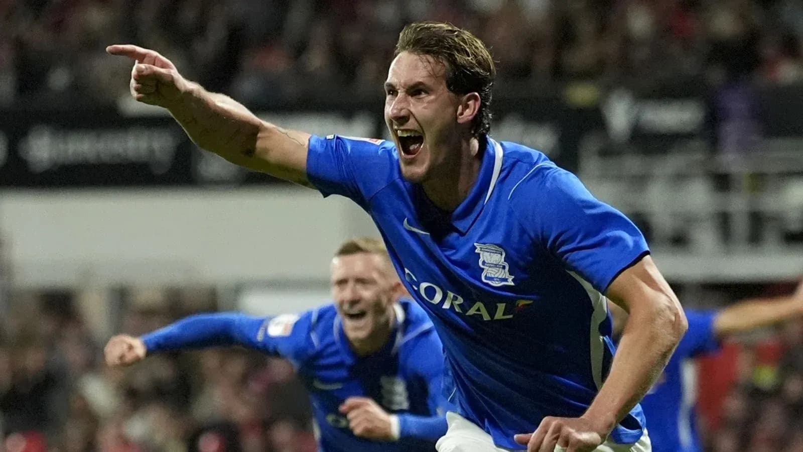 Birmingham City player celebrating a goal passionately