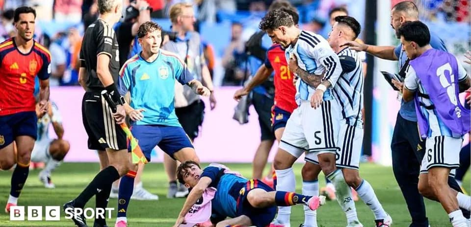 Players involved in a confrontation on the pitch