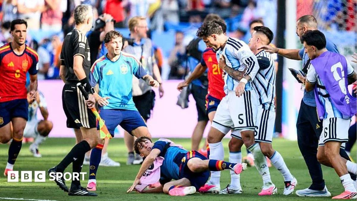 Players involved in a confrontation on the pitch