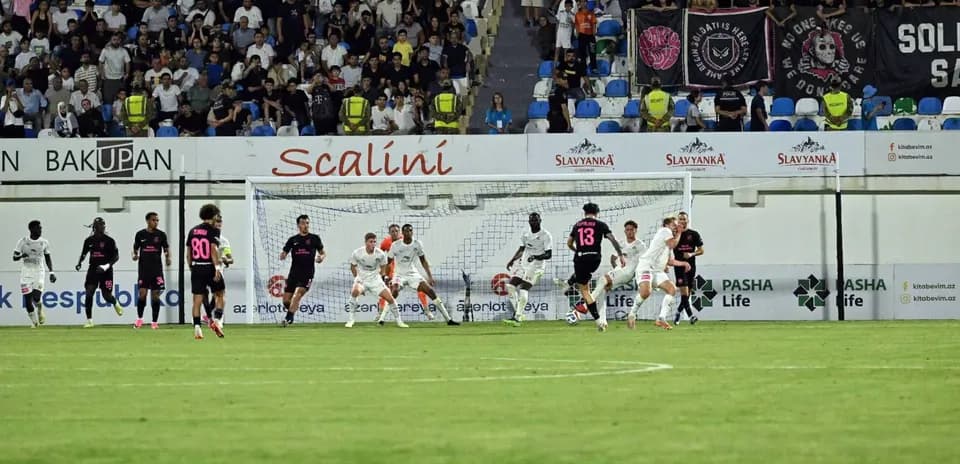 Players competing during KuPS vs Sabah FA match
