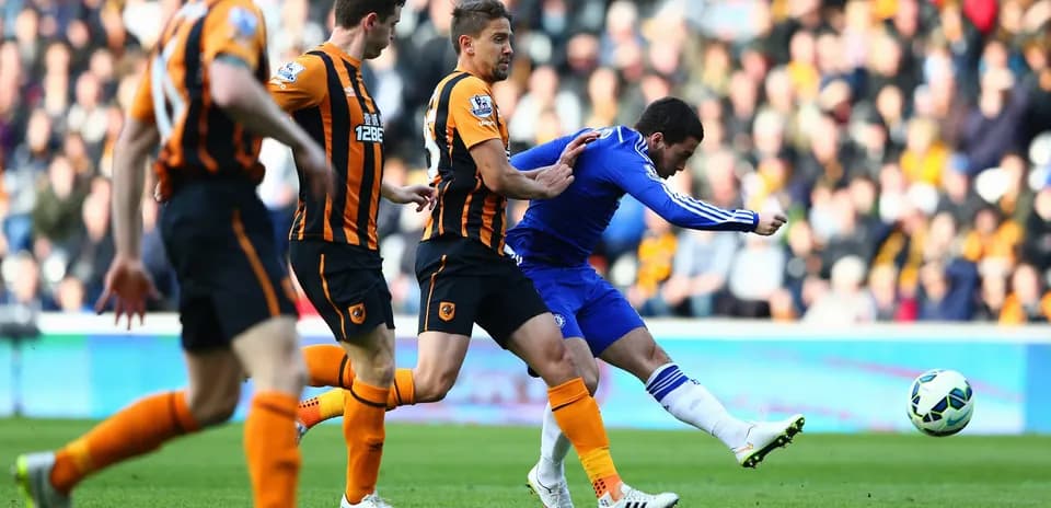 Chelsea player shoots during match against Hull City