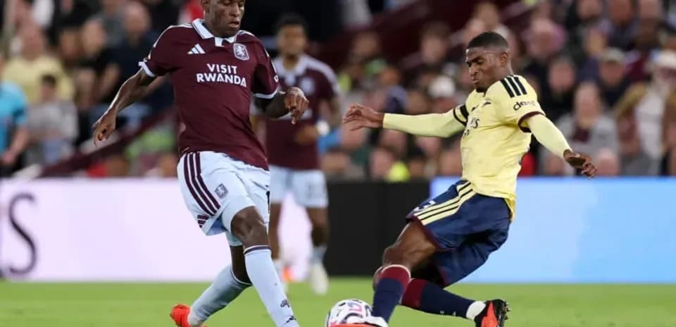Two players challenging for the ball during match