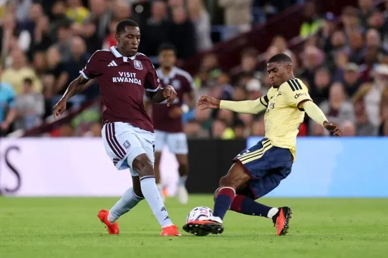 Two players challenging for the ball during match