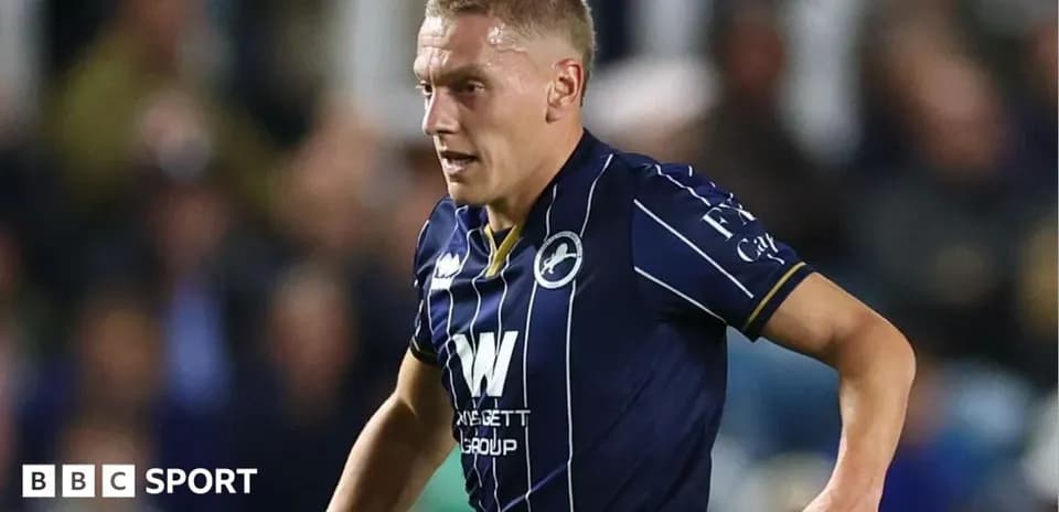 Player in Millwall kit running during match