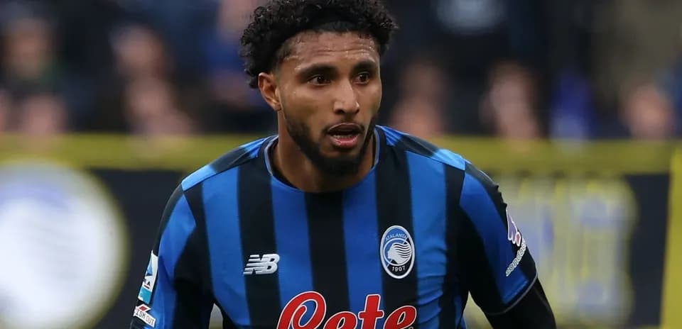 Player in blue and black striped jersey during match