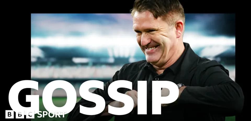 Coach smiling with stadium background during segment
