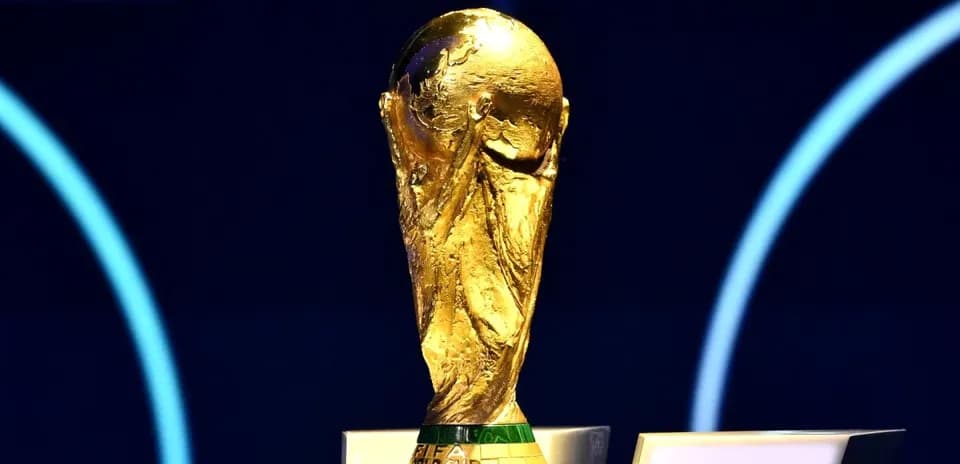 FIFA World Cup trophy displayed on a podium