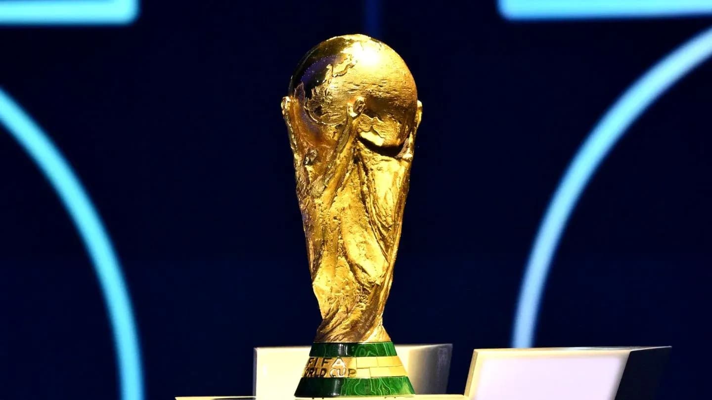 FIFA World Cup trophy displayed on a podium