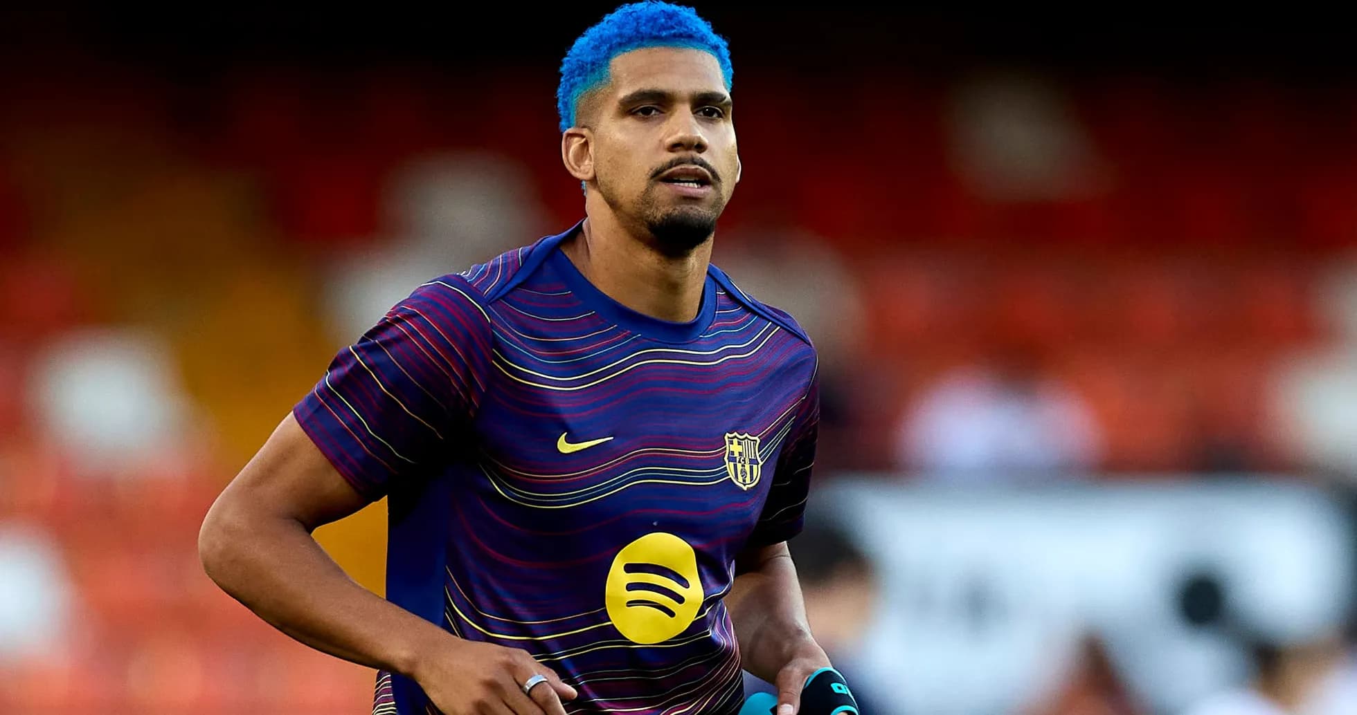 Player warming up in Barcelona jersey before match
