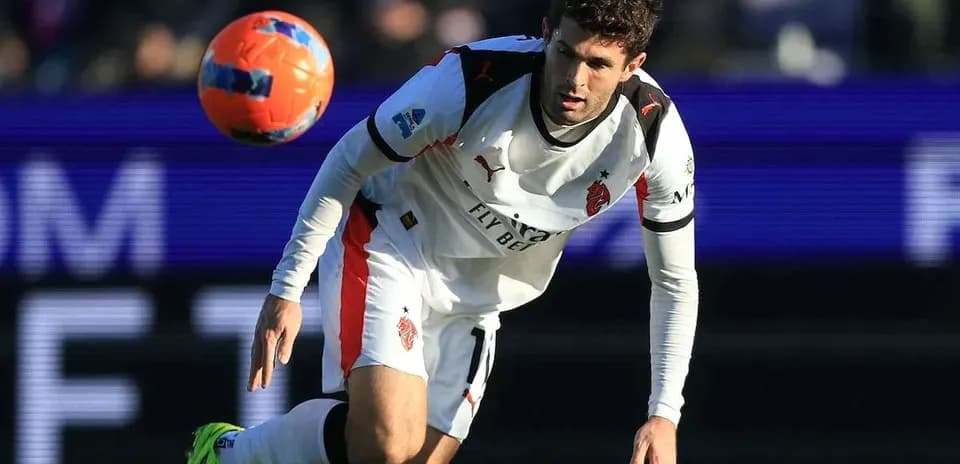 Player heading the ball during a match