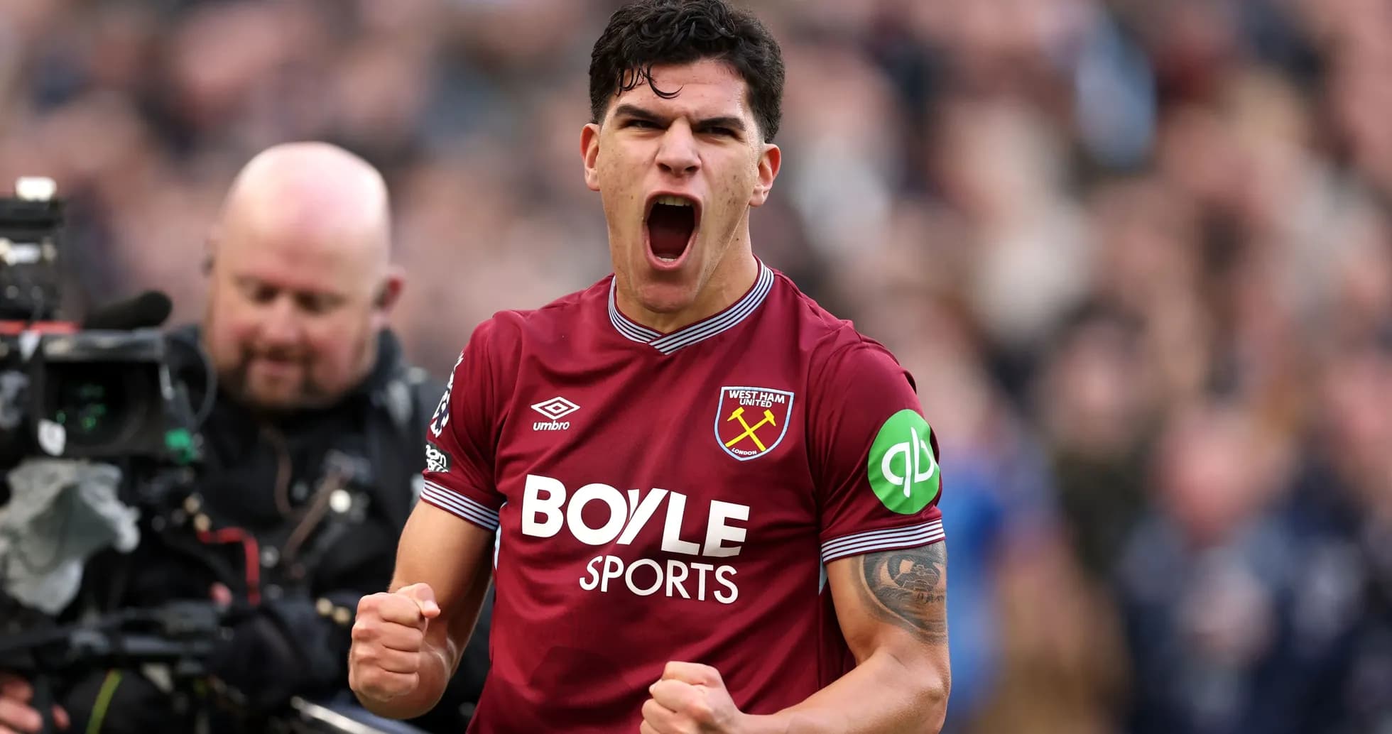 West Ham United player celebrating passionately on field