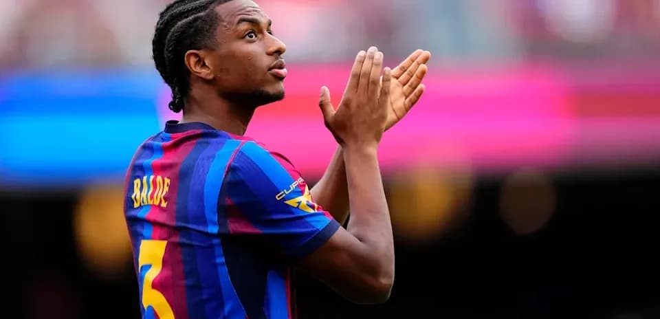 Player applauding fans during match at Camp Nou