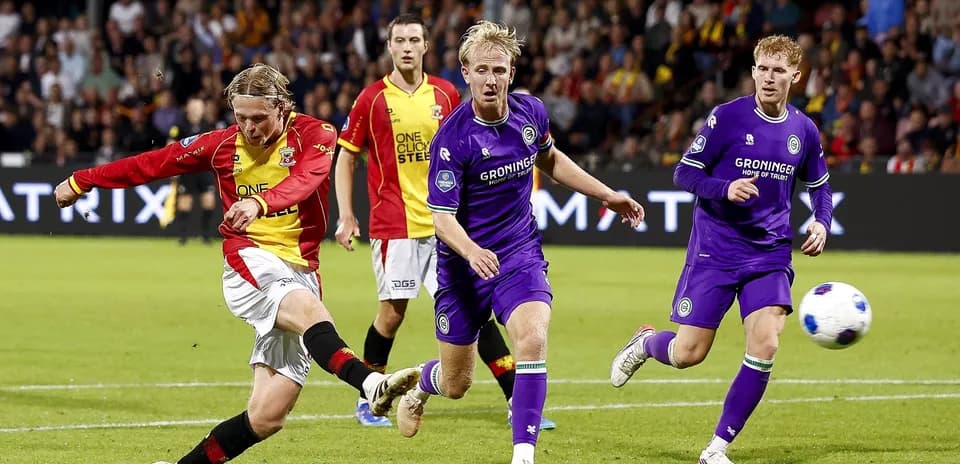 Player shooting the ball during a match