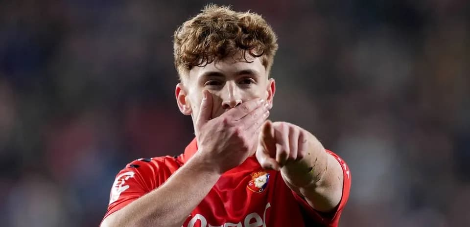 Player celebrating with hand gesture on the field