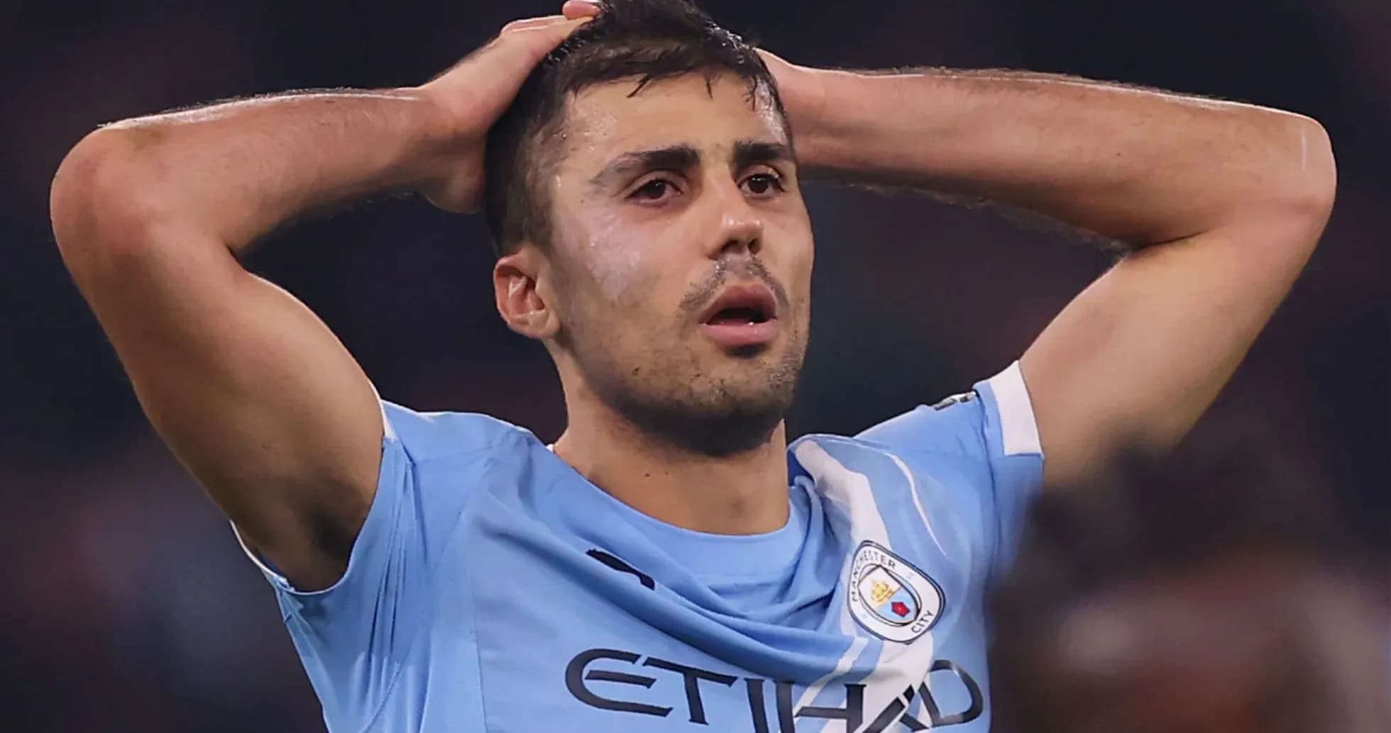 Player holding head in frustration during match