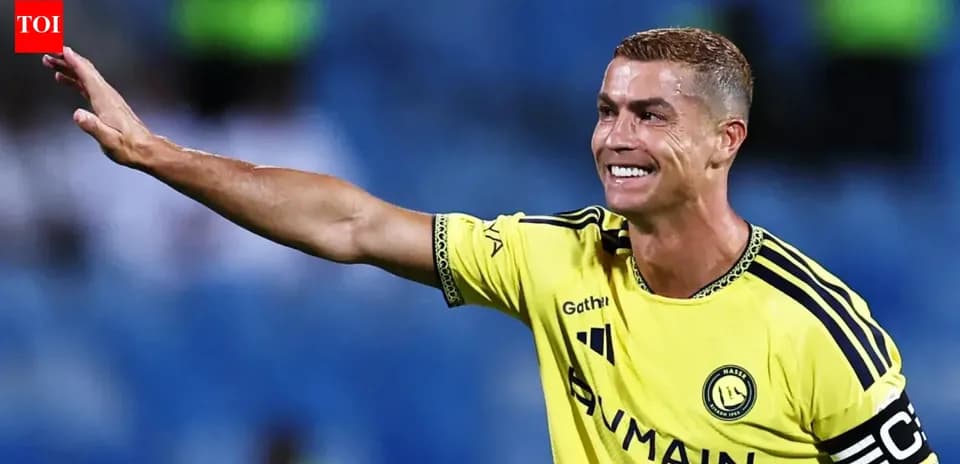 Cristiano Ronaldo waving while in yellow jersey