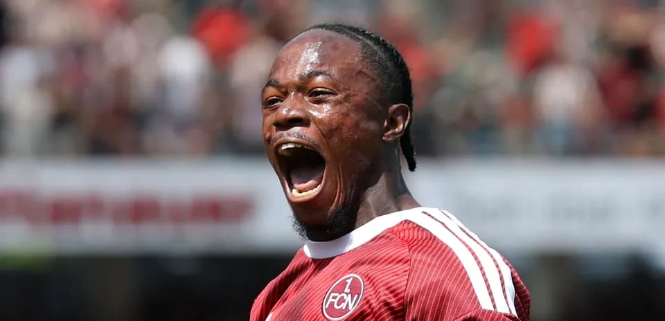 Player celebrating passionately during a football match