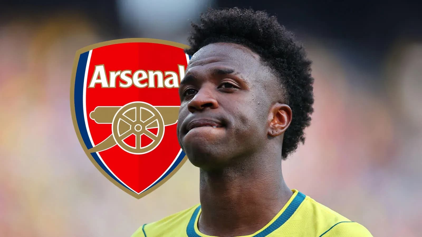 Player in Arsenal kit with club logo behind