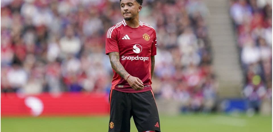 Jadon Sancho in Manchester United kit on field