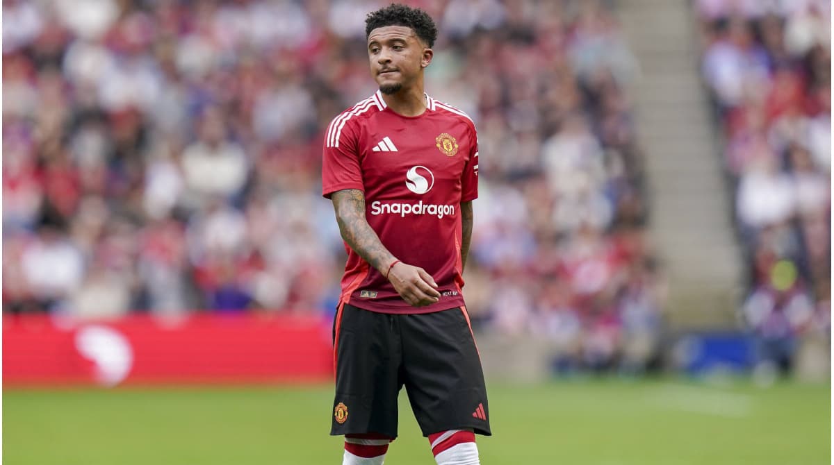 Jadon Sancho in Manchester United kit on field