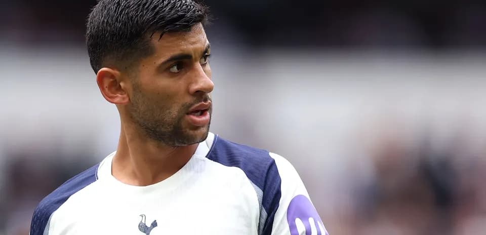 Player in Tottenham kit during match action