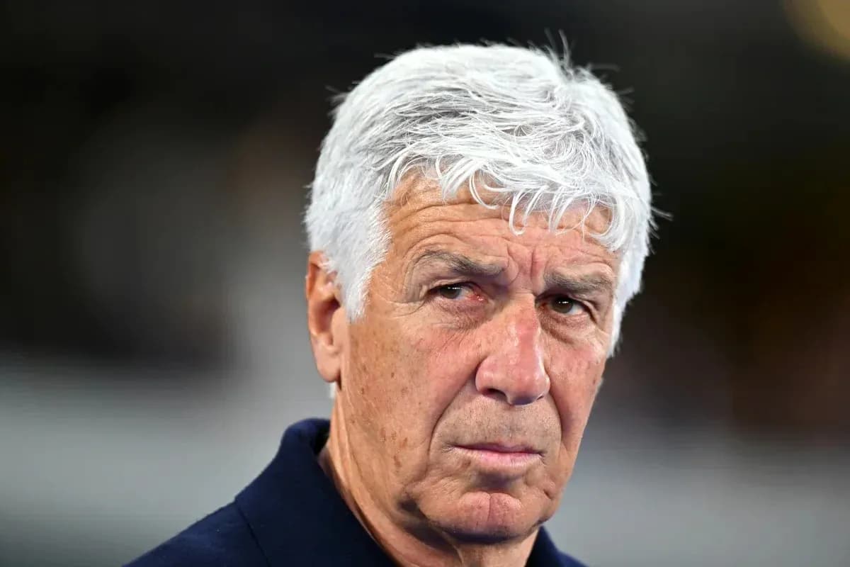 Coach with gray hair during match observation
