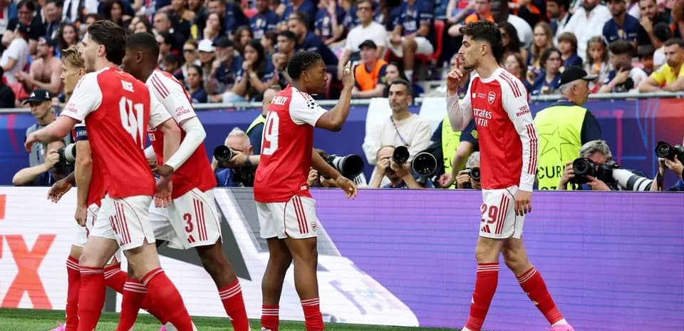 Arsenal players celebrating a goal during match