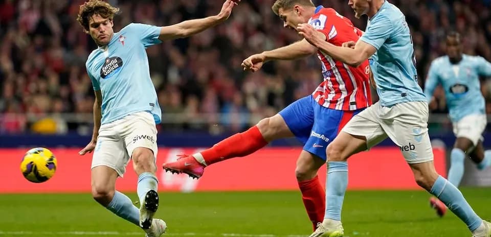 Atletico Madrid player shooting during match