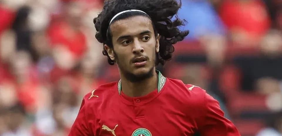 Player in red Morocco jersey during match action