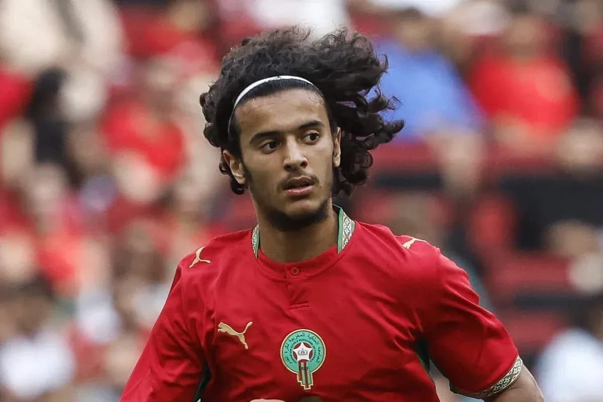 Player in red Morocco jersey during match action