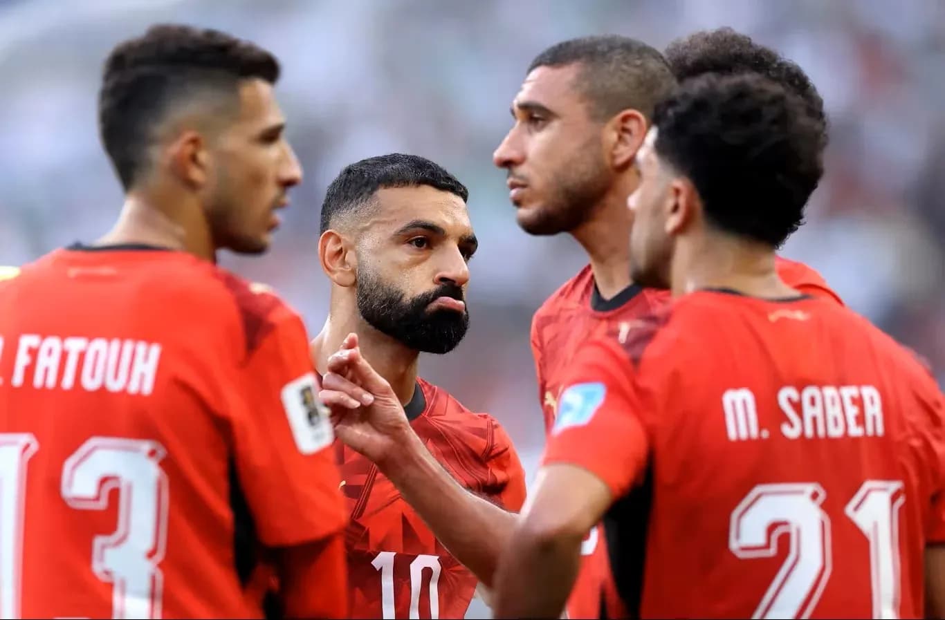 Egypt players discussing strategy during match