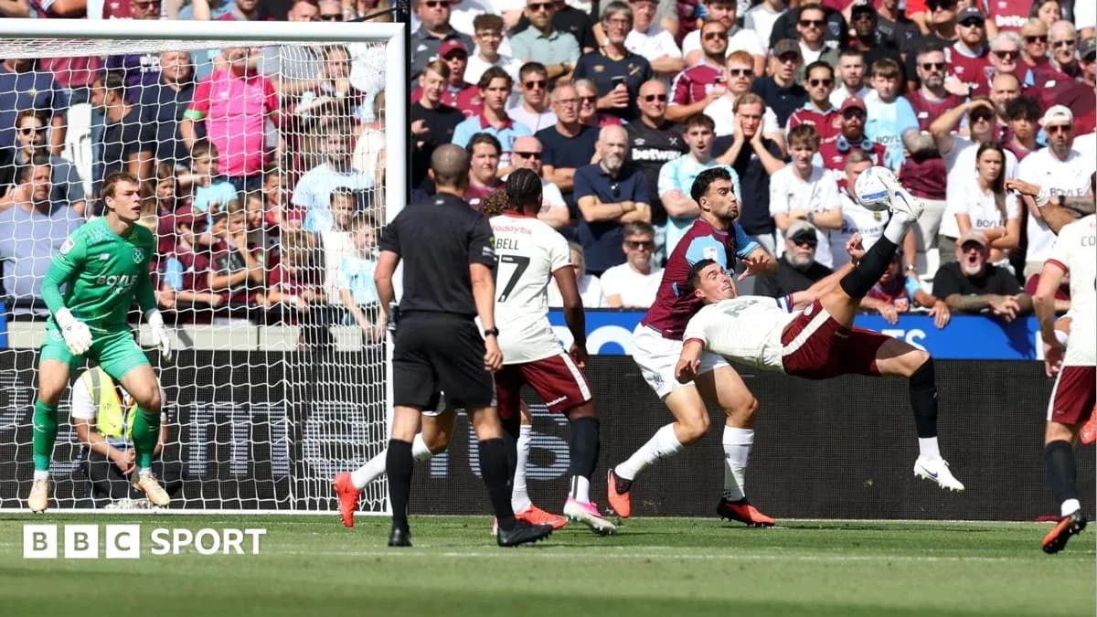 Player performing a bicycle kick near goal