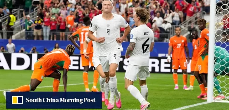 Players celebrating after scoring a goal during match