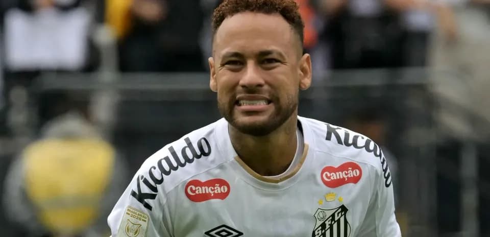 Player celebrating after scoring a goal during match