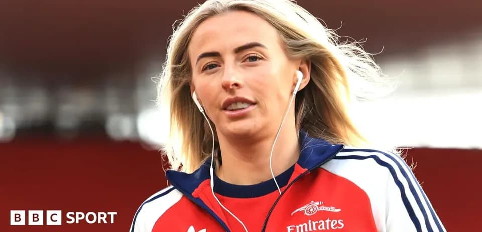 Female athlete wearing earbuds walking towards camera