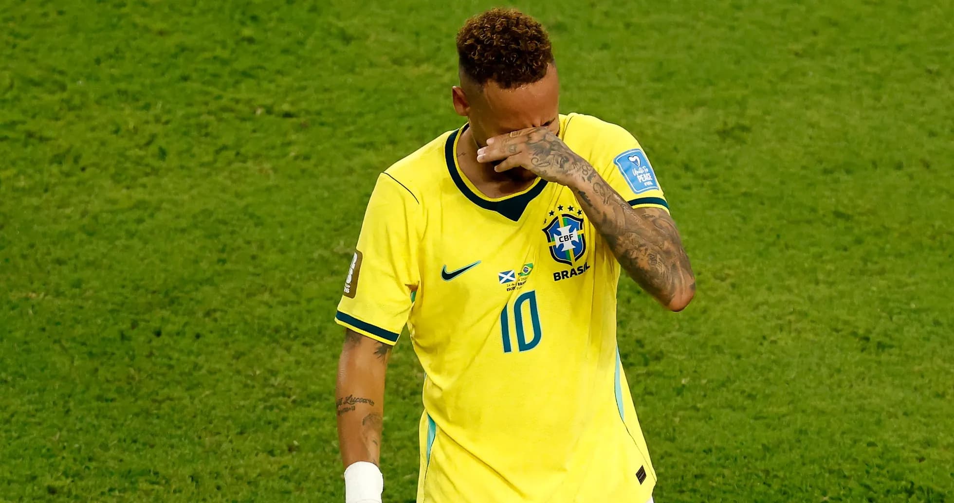 Player in Brazil jersey reacting on the field