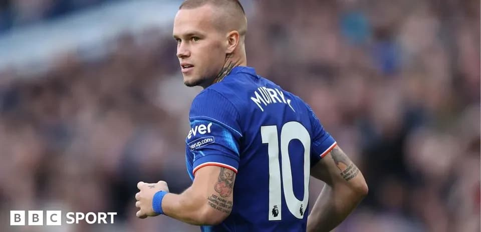 Player wearing number 10 jersey on the field